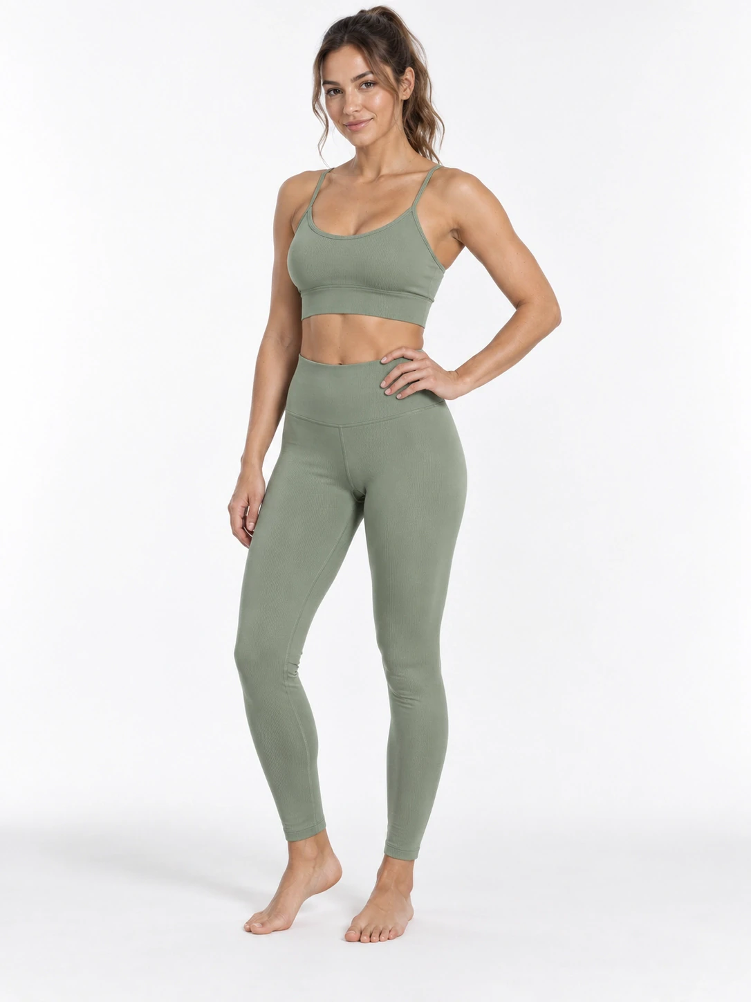 A sage green leggings and sports bra set on a virtual model