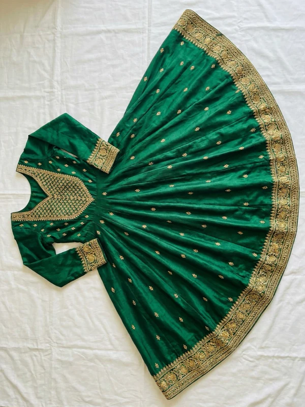 Flat lay of a green anarkali kurta
