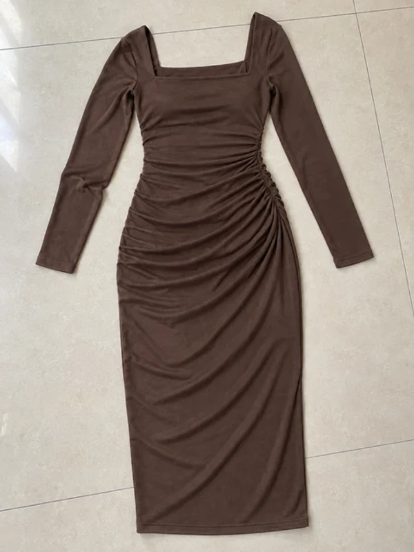 Flat lay of a cocoa-brown ruched dress