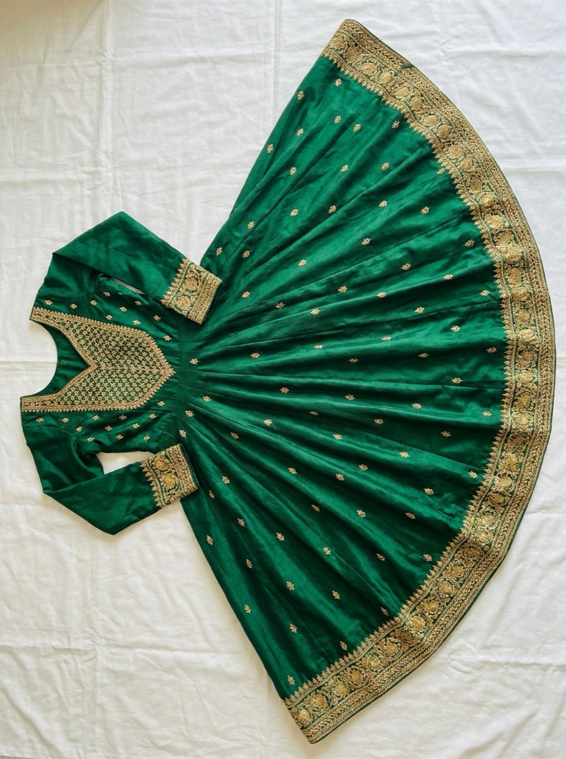 Unstitched suit pieces photographed flat before AI photoshoot